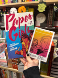 Pre-Order Paper Girls Backpack Edition Volume 1 with an OK Comics Exclusive Signed Print by Brian K Vaughan and Cliff Chiang